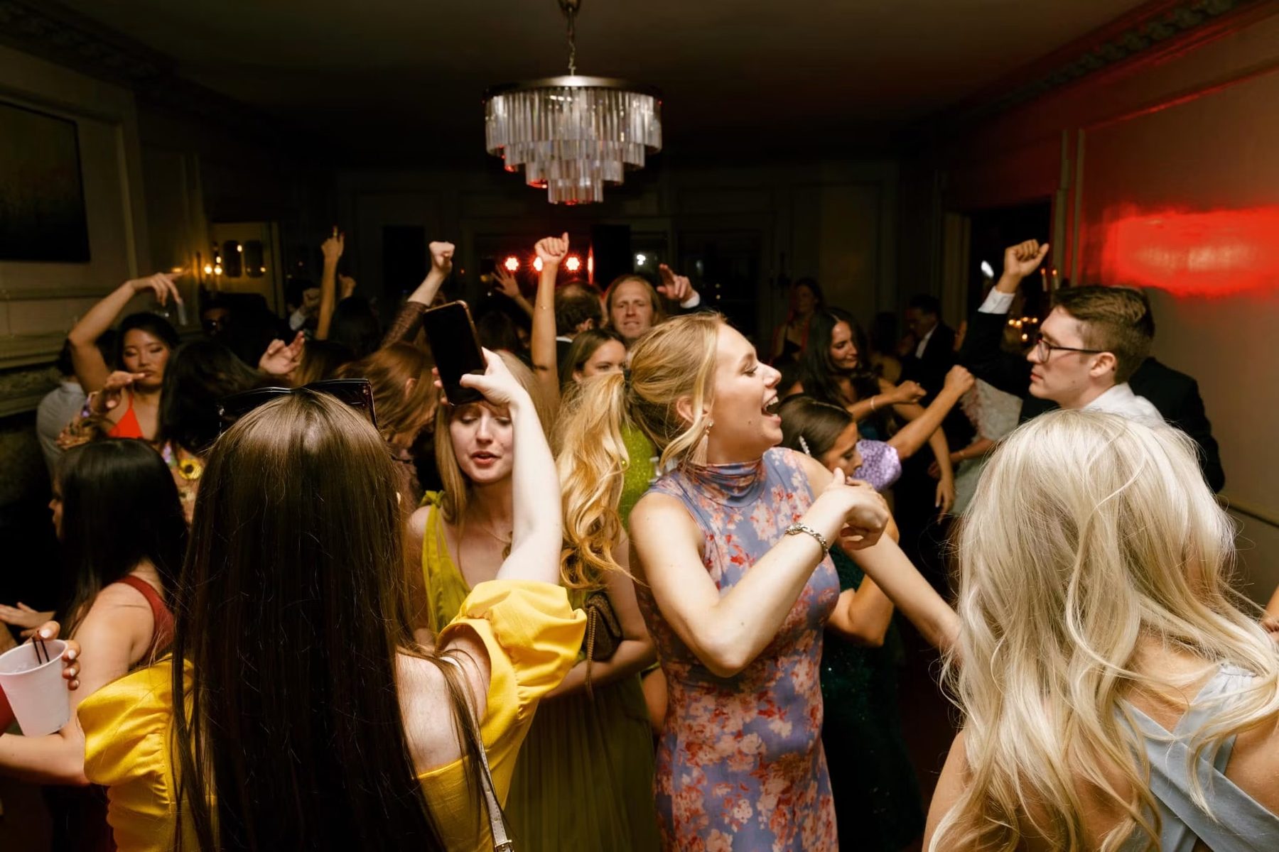 iSecret Records wedding dance floor under chandelier in Los Angeles