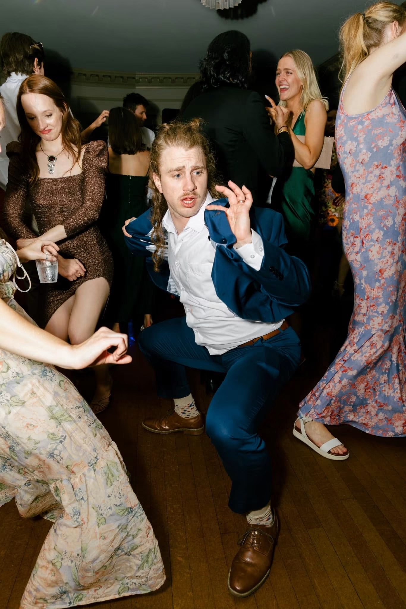 Guest dancing at an iSecret Records wedding reception